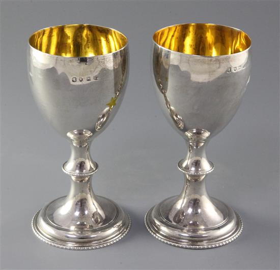 A pair of George III silver wine goblets, 14.4 oz.